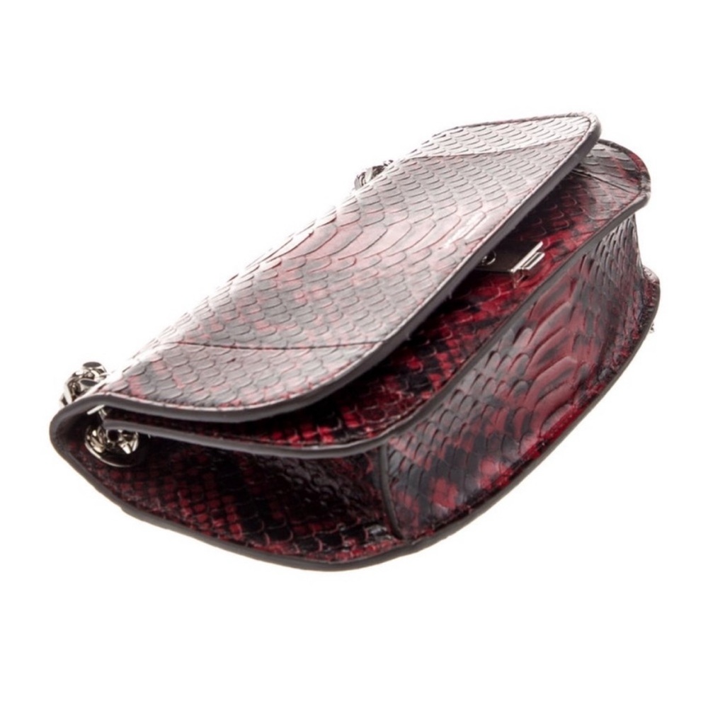 Michael Kors collection runway
CHRISTIE PYTHON EMBOSSED
LEATHER BAG RETAIL 1,090 - Picture 6 of 10